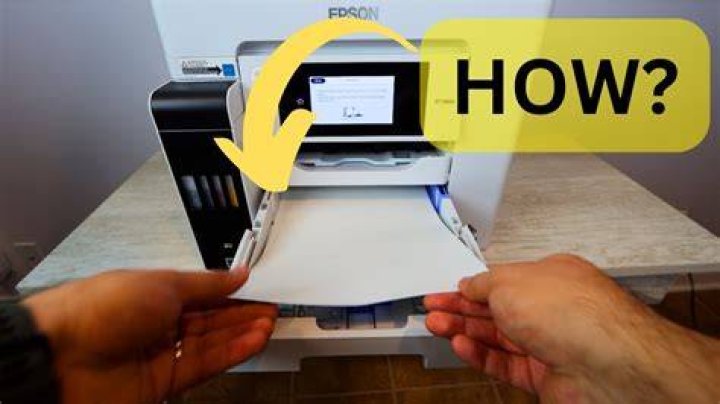 How do I load paper in my Epson WF 2630?