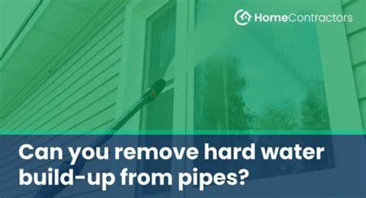 How do you remove hard water scale from pipes?