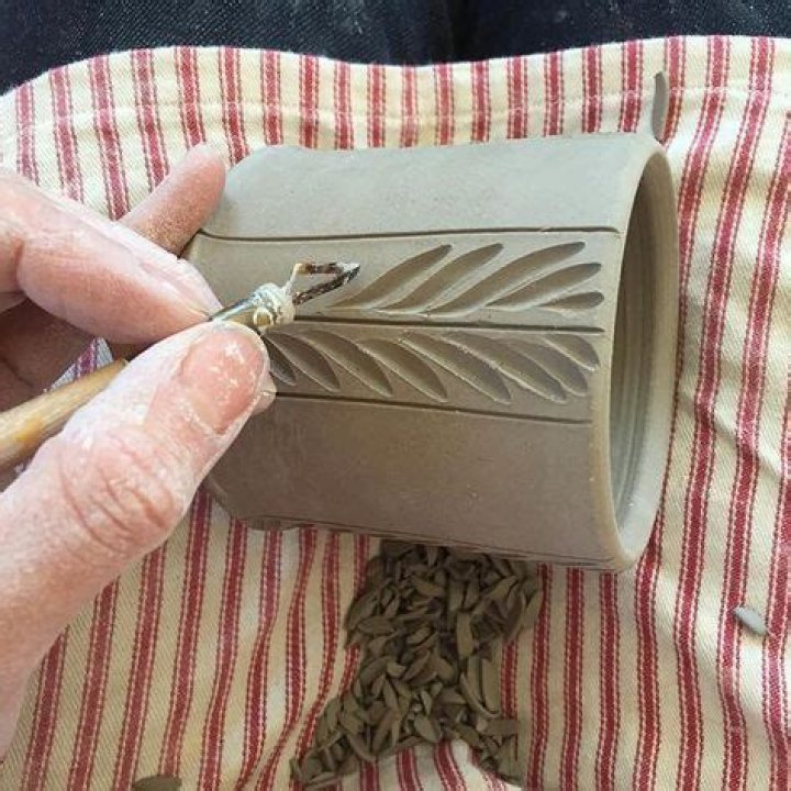 What is incising in pottery?